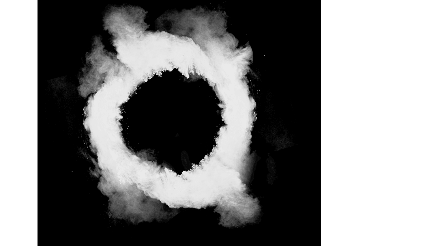 Freeze motion of white dust in round shape isolated on black background